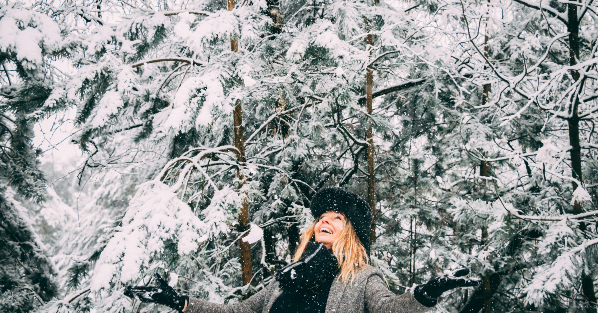 Modest winter fashion outfit with long coat layered over stylish winter clothing