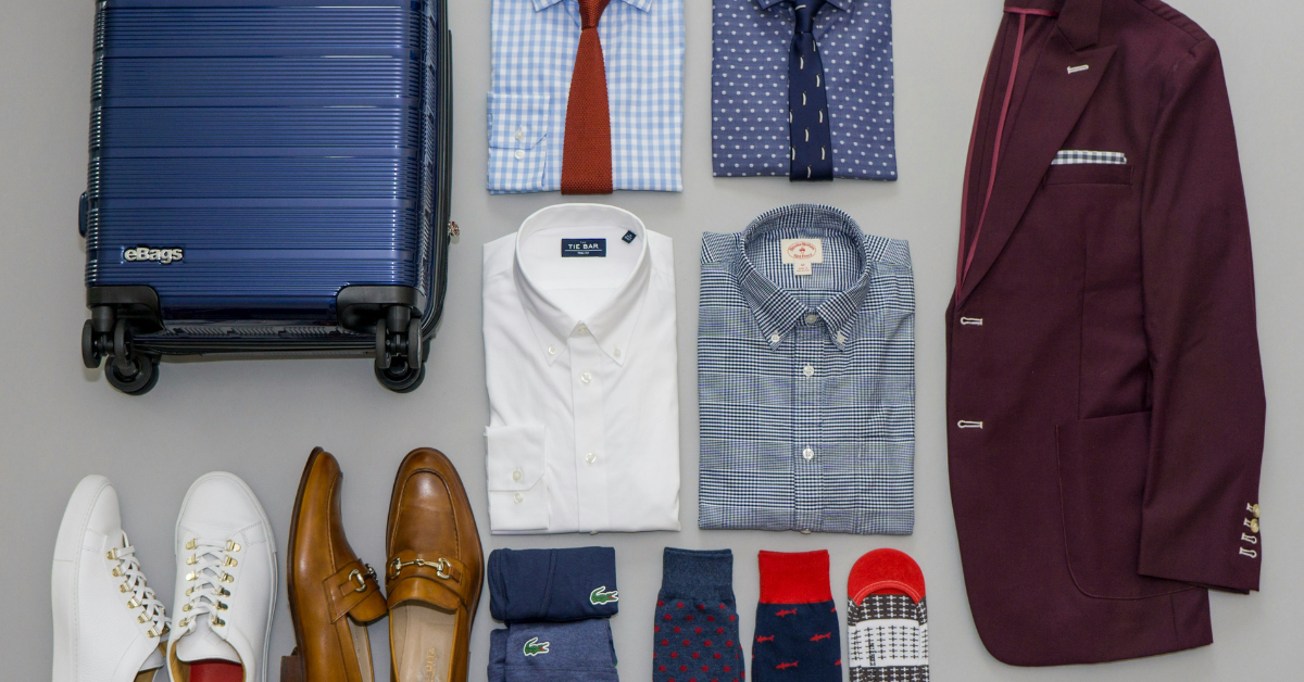 minimal wardrobe with neutral clothing showing a simple personal uniform style formula