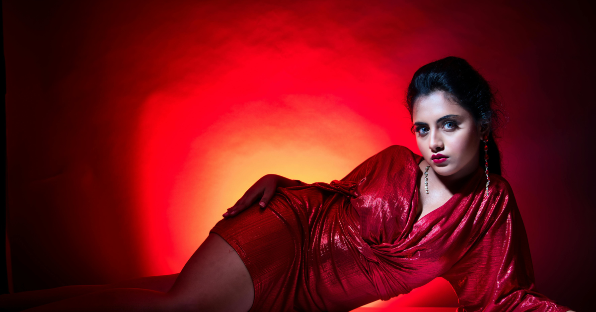 Woman wearing a white dress with elegant bell sleeves showing sleeve style in women’s clothing