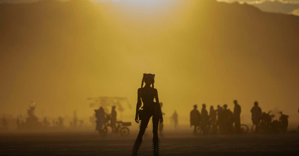 Coachella inspired festival fashion outfit with futuristic style in a desert music festival setting