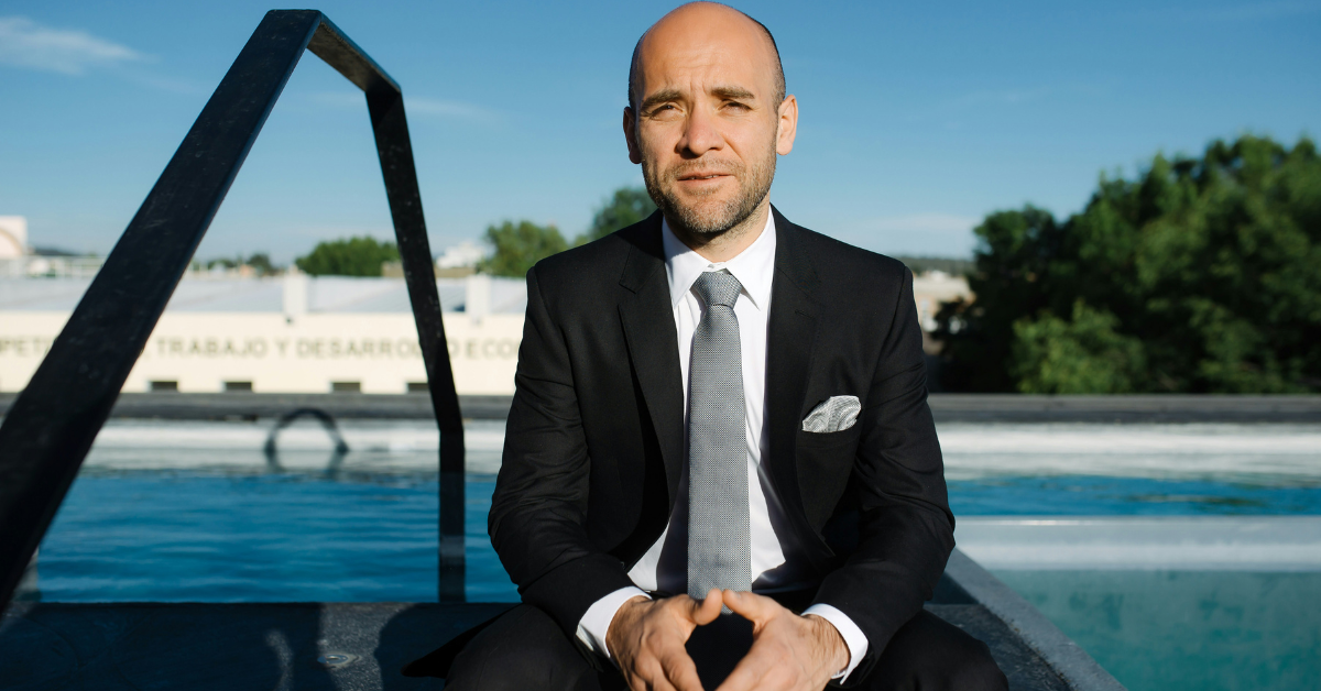 Man comparing double breasted suit and single breasted suit styles showing modern formal mens fashion differences in tailoring fit and structure