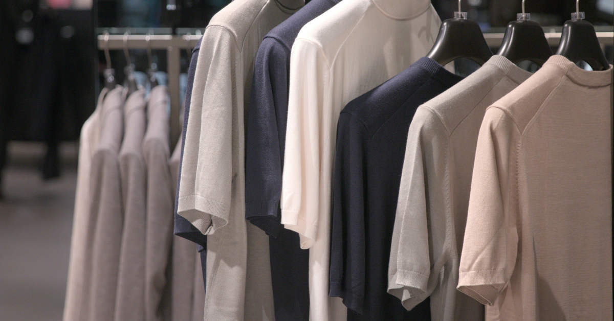 fashionable men's clothing store near me with stylish shirts jackets and modern outfits displayed on racks inside a local menswear shop