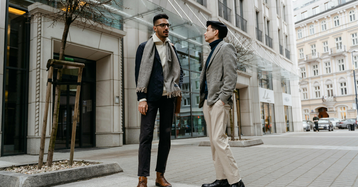 Men’s smart vs business dress code comparison showing smart casual blazer outfit and formal business suit styling side by side