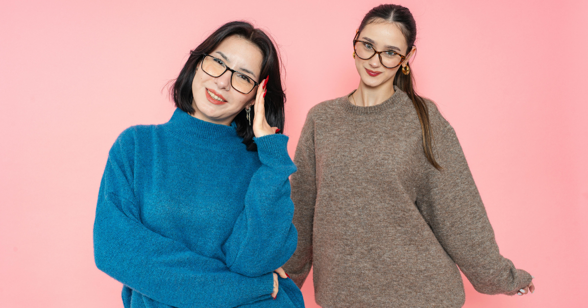woman wearing different sweater necklines including crew neck and v neck