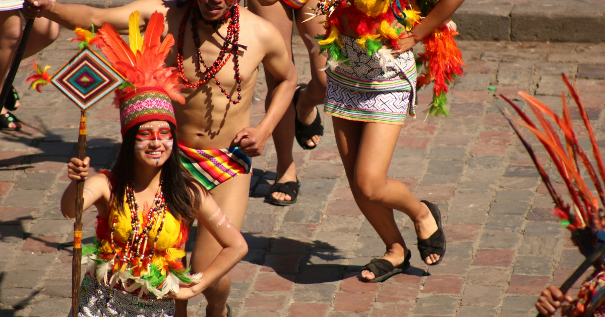 First-time attendees wearing colorful costumes at a Rocky Horror themed event